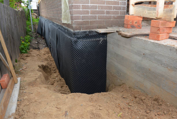 SJ Waterproofing Pros technician performing targeted Interior Drainage System assessment in Trinity, NC